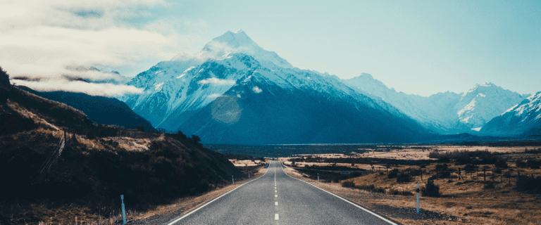 A highway leads to a mountain