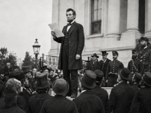 Abraham Lincoln giving a speech to a crowed