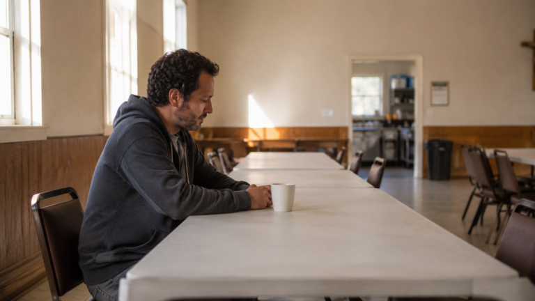 Person alone in a church hall